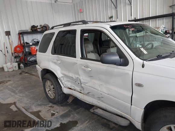 2006 Mercury Mariner Luxury с VIN 4M2YU57116DJ03832, выставлен на аукционе IAAI как лот 41790719 с пробегом 161 978 миль миль и . История ставок и продаж доступна на DreamBid. Изображение 6.