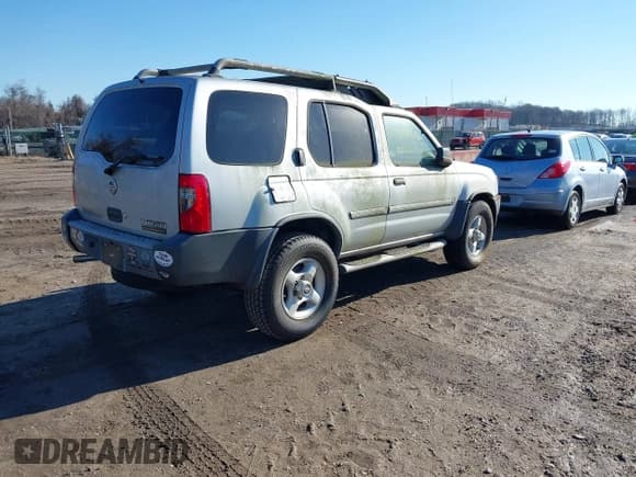 ✅ 2002 Nissan Xterra SE • VIN: 5N1ED28T32C527709 • Lot: 41594940. Listed on IAAI with 98,559 mi. Free auction sales archive from the USA and detailed vehicle history report at DreamBid. Image 4.