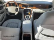 ✅ 2003 Jaguar XJ 8 • VIN: SAJDA14C33LF59347 • Лот: 42795385. Опубликован ранее на Copart с пробегом 62 519 миль. Бесплатный доступ к архиву аукционных продаж из США и подробный отчёт об истории автомобиля на DreamBid. Изображение 8.