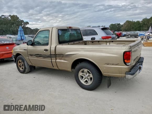 ✅ 1999 Mazda B-Series SX • VIN: 4F4YR12C7XTM22336 • Lot: 93998875. Listed on Copart with 304,120 mi. Free auction sales archive from the USA and detailed vehicle history report at DreamBid. Image 2.