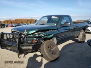 ✅ 2002 Dodge RAM • VIN: 3B7KF26W22M285766 • Lot: 77415574. Listed on Copart with 12,275 mi. Free auction sales archive from the USA and detailed vehicle history report at DreamBid. Image 1.