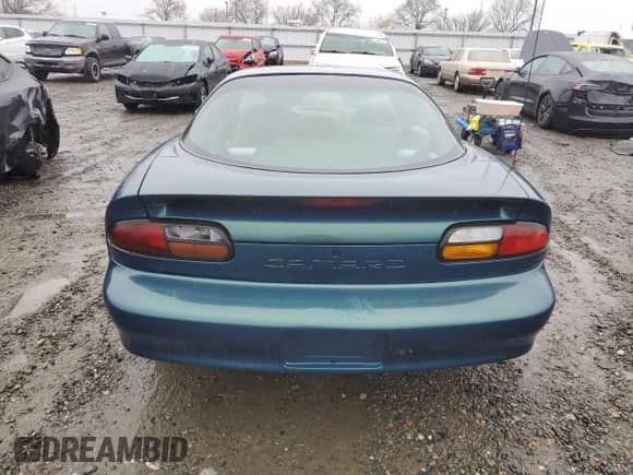 1997 Chevrolet Camaro z VIN 2G1FP22K2V2137195, wystawiony jako Copart lot #46000735 z przebiegiem 96 313 mil mil oraz Czysty tytuł • Clean title. Historia ofert i sprzedaży dostępna na DreamBid. Obrazek 6.