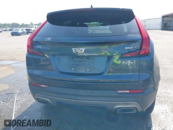 ✅ 2021 Cadillac XT4 FWD Premium Luxury • VIN: 1GYFZCR42MF007617 • Лот: 42437974. Опубликован ранее на IAAI с пробегом 126 071 миль. Бесплатный доступ к архиву аукционных продаж из США и подробный отчёт об истории автомобиля на DreamBid. Изображение 16.