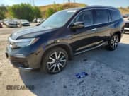 ✅ 2020 Honda Pilot Elite • VIN: 5FNYF6H07LB059545 • Lot: 69449805. Wystawiony na Copart z przebiegiem 73 388 mil. Bezpłatny archiwum sprzedaży aukcyjnych z USA i szczegółowy raport historii pojazdu na DreamBid. Zdjęcie 1.