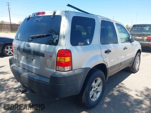 ✅ 2006 Ford Escape XLT • VIN: 1FMYU03196KC34657 • Lot: 42207202. Listed on IAAI with 235,799 mi. Free auction sales archive from the USA and detailed vehicle history report at DreamBid. Image 4.