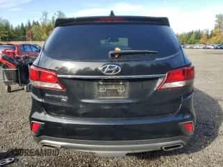 2019 Hyundai Santa Fe SE with VIN KM8SM4HF7KU301062, listed as a Copart auction lot 82176595 with Not provided miles and Salvage title. Bid and sale history available at DreamBid. Image 6.