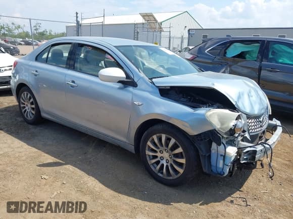 ✅ 2010 Suzuki Kizashi SE • VIN: JS2RE9A34A6100712 • Lot: 42965644. Listed on IAAI with 169,953 mi. Free auction sales archive from the USA and detailed vehicle history report at DreamBid. Image 1.