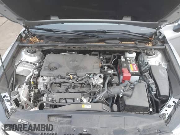 2022 Toyota Camry LE with VIN 4T1R11BKXNU066513, listed as a IAAI auction lot 41324509 with 19,488 mi miles and . Bid and sale history available at DreamBid. Image 5.