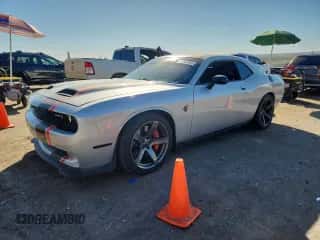 2019 Dodge Challenger SRT Hellcat с VIN 2C3CDZC99KH759457, выставлен на аукционе Copart как лот 87033995 с пробегом 33 883 миль миль и Списание • Salvage title. История ставок и продаж доступна на DreamBid. Изображение 1.