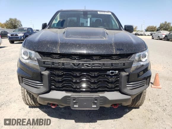 ✅ 2021 Chevrolet Colorado 4WD ZR2 • VIN: 1GCRTEEN5M1128122 • Лот: 80330175. Опубликован ранее на Copart с пробегом 76 144 миль. Бесплатный доступ к архиву аукционных продаж из США и подробный отчёт об истории автомобиля на DreamBid. Изображение 5.