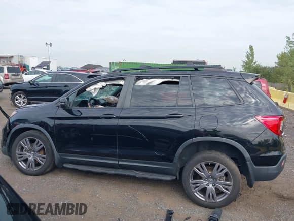 ✅ 2020 Honda Passport EX-L • VIN: 5FNYF8H54LB000055 • Lot: 43319655. Listed on IAAI with 14,502 mi. Free auction sales archive from the USA and detailed vehicle history report at DreamBid. Image 13.