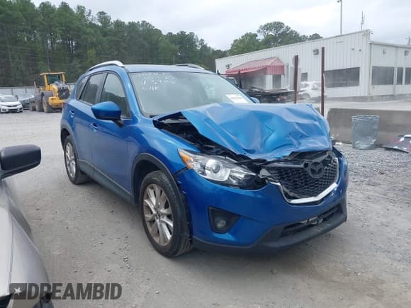 ✅ 2014 Mazda CX-5 Grand Touring • VIN: JM3KE2DY3E0343986 • Lot: 43373256. Wystawiony na IAAI z przebiegiem 171 454 mil. Bezpłatny archiwum sprzedaży aukcyjnych z USA i szczegółowy raport historii pojazdu na DreamBid. Zdjęcie 1.