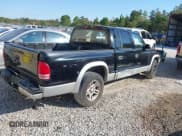 ✅ 2003 Dodge Dakota SLT • VIN: 1D7HL48X93S151422 • Lot: 40661577. Wystawiony na IAAI z przebiegiem 238 586 mil. Bezpłatny archiwum sprzedaży aukcyjnych z USA i szczegółowy raport historii pojazdu na DreamBid. Zdjęcie 4.