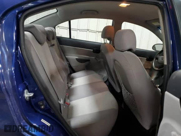 2009 Hyundai Accent Auto GLS z VIN KMHCN46C39U330367, wystawiony jako Copart lot #76639854 z przebiegiem 151 199 mil mil oraz Szkoda całkowita • Salvage title. Historia ofert i sprzedaży dostępna na DreamBid. Obrazek 10.