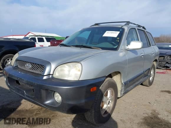 2004 Hyundai Santa Fe GLS z VIN KM8SC13EX4U799955, wystawiony jako IAAI lot #41240442 z przebiegiem 281 394 mil mil oraz . Historia ofert i sprzedaży dostępna na DreamBid. Obrazek 2.