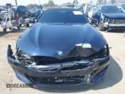 ✅ 2023 BMW 8 Series M850i xDrive • VIN: WBAFY4C07PCK10123 • Lot: 42160590. Listed on IAAI with 18,801 mi. Free auction sales archive from the USA and detailed vehicle history report at DreamBid. Image 13.