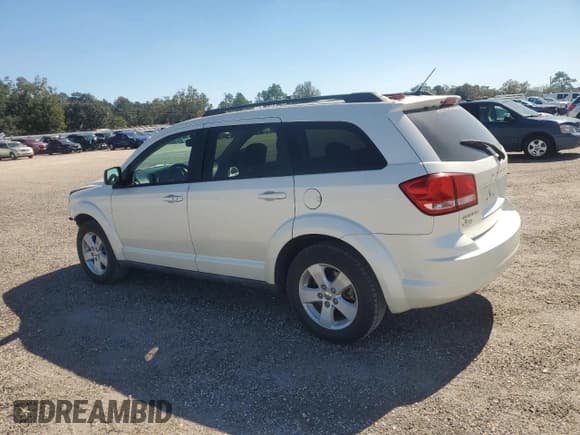 ✅ 2013 Dodge Journey SE • VIN: 3C4PDCAB2DT531780 • Lot: 82429355. Listed on Copart with 164,381 mi. Free auction sales archive from the USA and detailed vehicle history report at DreamBid. Image 2.