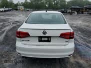 ✅ 2015 Volkswagen Jetta SE • VIN: 3VWD17AJ9FM233571 • Lot: 61436735. Listed on Copart with 58,690 mi. Free auction sales archive from the USA and detailed vehicle history report at DreamBid. Image 6.