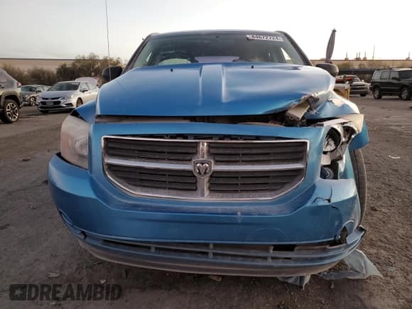 ✅ 2009 Dodge Caliber SXT • VIN: 1B3HB48A99D197923 • Лот: 84672724. Опубликован ранее на Copart с пробегом 111 268 миль. Бесплатный доступ к архиву аукционных продаж из США и подробный отчёт об истории автомобиля на DreamBid. Изображение 5.