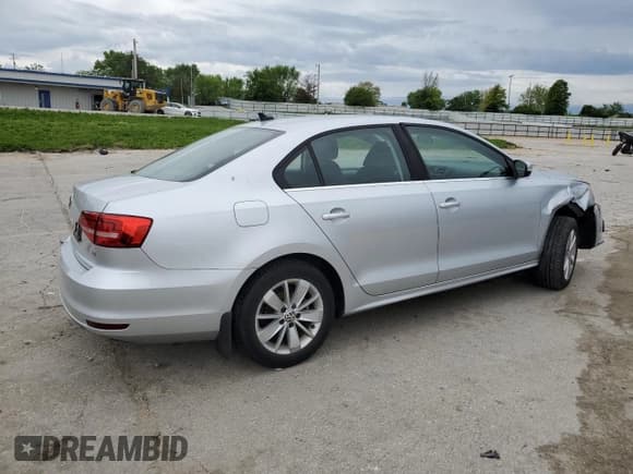 ✅ 2015 Volkswagen Jetta SE • VIN: 3VWD17AJ1FM311745 • Lot: 55936435. Listed on Copart with 79,819 mi. Free auction sales archive from the USA and detailed vehicle history report at DreamBid. Image 3.