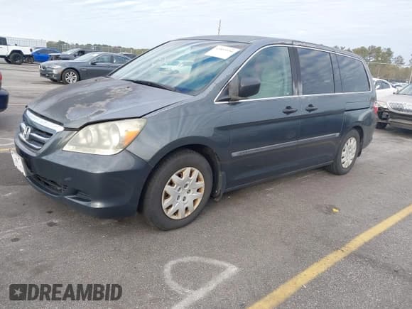 ✅ 2006 Honda Odyssey LX • VIN: 5FNRL38216B123368 • Lot: 43893556. Listed on IAAI with 229,501 mi. Free auction sales archive from the USA and detailed vehicle history report at DreamBid. Image 2.