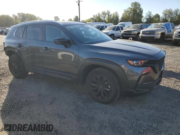 ✅ 2023 Mazda CX-50 S Preferred Plus • VIN: 7MMVABCM5PN111816 • Lot: 81817345. Listed on Copart with 27,225 mi. Free auction sales archive from the USA and detailed vehicle history report at DreamBid. Image 4.