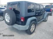 ✅ 2008 Jeep Wrangler Unlimited X • VIN: 1J4GA39148L612425 • Lot: 43266301. Listed on IAAI with 196,635 mi. Free auction sales archive from the USA and detailed vehicle history report at DreamBid. Image 4.