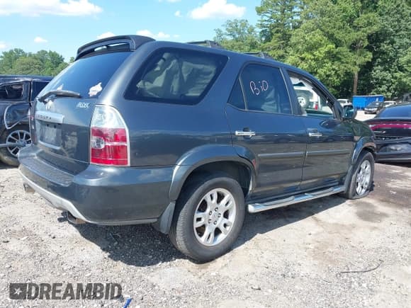 ✅ 2006 Acura MDX Touring • VIN: 2HNYD18976H523885 • Lot: 42718783. Listed on IAAI with 249,834 mi. Free auction sales archive from the USA and detailed vehicle history report at DreamBid. Image 4.