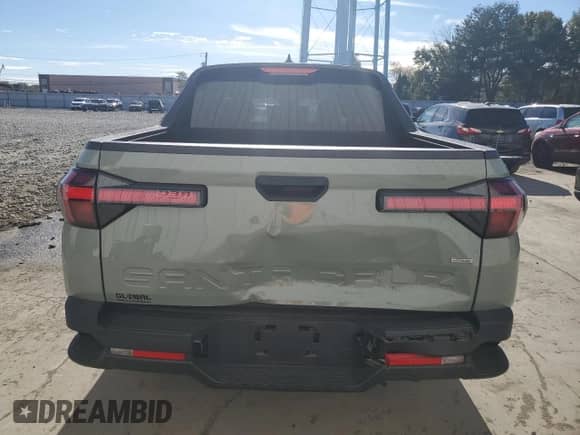 2022 Hyundai Santa Cruz SEL z VIN 5NTJBDAE6NH020359, wystawiony jako Copart lot #75840064 z przebiegiem 14 544 mil mil oraz Szkoda całkowita • Salvage title. Historia ofert i sprzedaży dostępna na DreamBid. Obrazek 6.