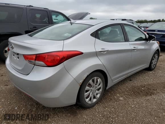 2012 Hyundai Elantra Limited с VIN KMHDH4AE0CU465981, выставлен на аукционе Copart как лот 84930515 с пробегом 296 957 миль миль и Списание • Salvage title. История ставок и продаж доступна на DreamBid. Изображение 3.