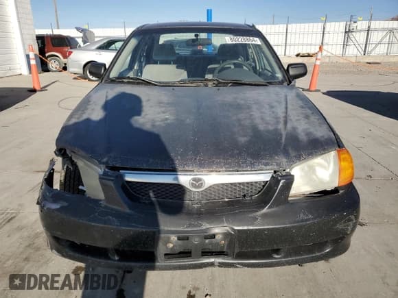 ✅ 2000 Mazda Protege DX • VIN: JM1BJ2220Y0239835 • Lot: 80228864. Wystawiony na Copart z przebiegiem 200 936 mil. Bezpłatny archiwum sprzedaży aukcyjnych z USA i szczegółowy raport historii pojazdu na DreamBid. Zdjęcie 5.