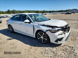 ✅ 2023 Honda Civic Touring • VIN: 2HGFE1F90PH319235 • Лот: 85580635. Опубликован ранее на Copart с пробегом 34 637 миль. Бесплатный доступ к архиву аукционных продаж из США и подробный отчёт об истории автомобиля на DreamBid. Изображение 4.