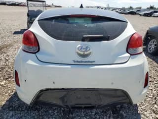 ✅ 2013 Hyundai Veloster w/Gray Int • VIN: KMHTC6AD1DU117136 • Lot: 69376474. Wystawiony na Copart z przebiegiem 153 824 mil. Bezpłatny archiwum sprzedaży aukcyjnych z USA i szczegółowy raport historii pojazdu na DreamBid. Zdjęcie 6.