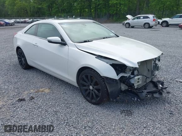 ✅ 2015 Cadillac ATS Standard AWD • VIN: 1G6AG1RX5F0120524 • Lot: 42346328. Wystawiony na IAAI z przebiegiem 80 538 mil. Bezpłatny archiwum sprzedaży aukcyjnych z USA i szczegółowy raport historii pojazdu na DreamBid. Zdjęcie 1.