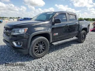 ✅ 2018 Chevrolet Colorado 2WD Z71 • VIN: 1GCGSDEN0J1213028 • Лот: 51243845. Опубликован ранее на Copart с пробегом 66 519 миль. Бесплатный доступ к архиву аукционных продаж из США и подробный отчёт об истории автомобиля на DreamBid. Изображение 1.