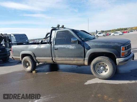 ✅ 1989 Chevrolet Silverado 1500 • VIN: 1GCDK14K5KE232628 • Lot: 43511254. Wystawiony na IAAI z przebiegiem 117 887 mil. Bezpłatny archiwum sprzedaży aukcyjnych z USA i szczegółowy raport historii pojazdu na DreamBid. Zdjęcie 13.