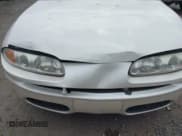 ✅ 2001 Oldsmobile Aurora • VIN: 1G3GR64H514231672 • Lot: 41872542. Wystawiony na IAAI z przebiegiem 167 271 mil. Bezpłatny archiwum sprzedaży aukcyjnych z USA i szczegółowy raport historii pojazdu na DreamBid. Zdjęcie 6.