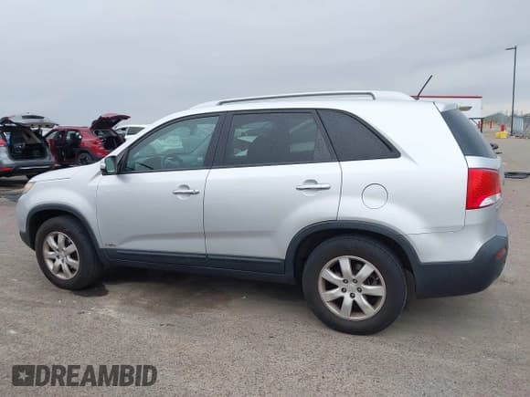✅ 2012 Kia Sorento LX • VIN: 5XYKTCA69CG202418 • Lot: 43647666. Listed on IAAI with 158,953 mi. Free auction sales archive from the USA and detailed vehicle history report at DreamBid. Image 13.