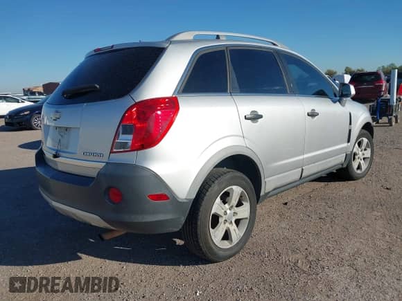 2015 Chevrolet Captiva Sport LS z VIN 3GNAL2EK1FS527166, wystawiony jako IAAI lot #43606030 z przebiegiem 149 603 mil mil oraz . Historia ofert i sprzedaży dostępna na DreamBid. Obrazek 4.