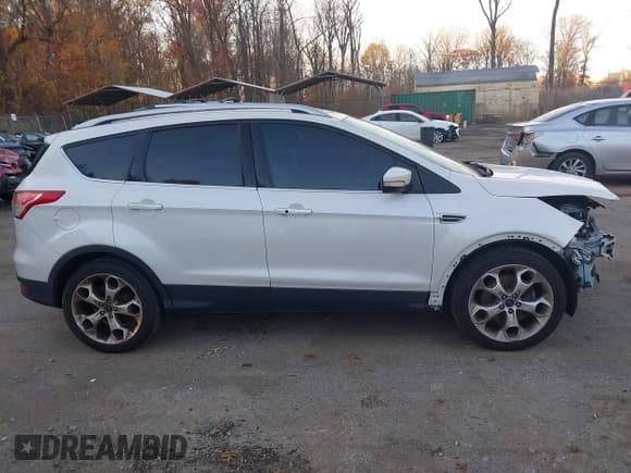 ✅ 2015 Ford Escape Titanium • VIN: 1FMCU9J97FUB69268 • Lot: 43748640. Listed on IAAI with 191,366 mi. Free auction sales archive from the USA and detailed vehicle history report at DreamBid. Image 14.