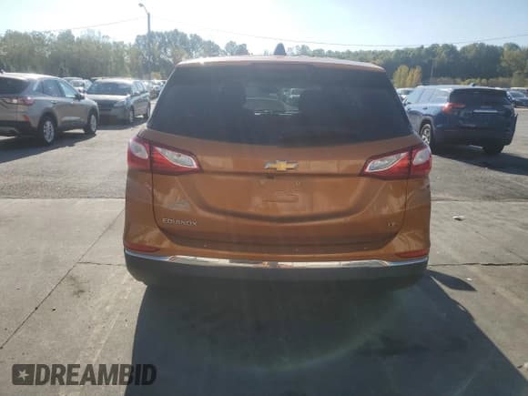 ✅ 2018 Chevrolet Equinox LT • VIN: 2GNAXJEV3J6159170 • Lot: 87039195. Wystawiony na Copart z przebiegiem 88 287 mil. Bezpłatny archiwum sprzedaży aukcyjnych z USA i szczegółowy raport historii pojazdu na DreamBid. Zdjęcie 6.