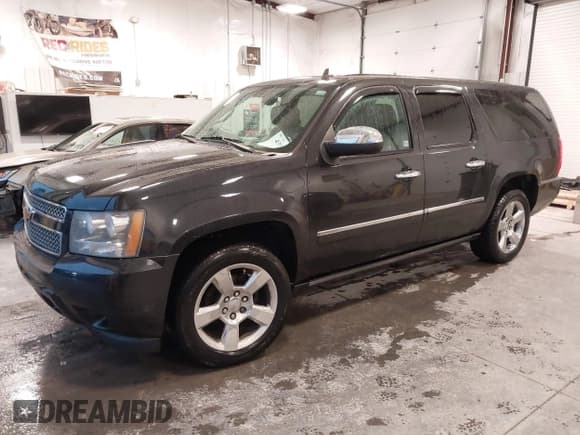 ✅ 2010 Chevrolet Suburban LTZ • VIN: 1GNUKKE36AR197402 • Lot: 43824032. Listed on IAAI with 146,390 mi. Free auction sales archive from the USA and detailed vehicle history report at DreamBid. Image 2.