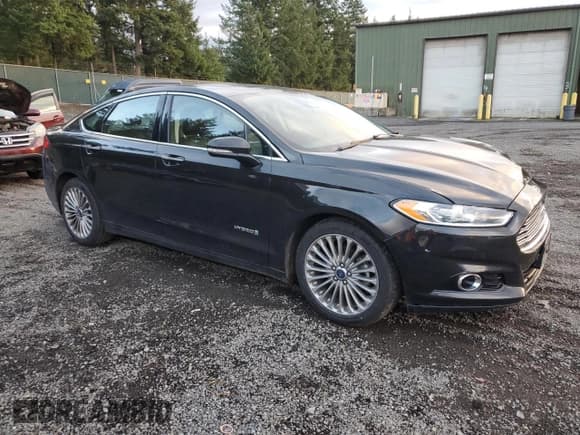 ✅ 2013 Ford Fusion Titanium Hybrid • VIN: 3FA6P0RU5DR368519 • Lot: 93022625. Wystawiony na Copart z przebiegiem 123 902 mil. Bezpłatny archiwum sprzedaży aukcyjnych z USA i szczegółowy raport historii pojazdu na DreamBid. Zdjęcie 4.