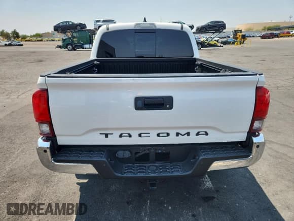 ✅ 2021 Toyota Tacoma SR5 • VIN: 3TMAZ5CN2MM145848 • Lot: 64952395. Listed on Copart with 83,388 mi. Free auction sales archive from the USA and detailed vehicle history report at DreamBid. Image 6.