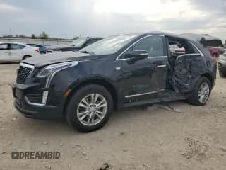 ✅ 2021 Cadillac XT5 FWD Luxury • VIN: 1GYKNAR45MZ235446 • Лот: 82462115. Опубликован ранее на Copart с пробегом 44 252 миль. Бесплатный доступ к архиву аукционных продаж из США и подробный отчёт об истории автомобиля на DreamBid. Изображение 1.