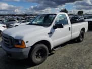 ✅ 1999 Ford F-250 XL • VIN: 1FTNF20L0XEE66230 • Lot: 43586355. Listed on Copart with 183,821 mi. Free auction sales archive from the USA and detailed vehicle history report at DreamBid. Image 1.