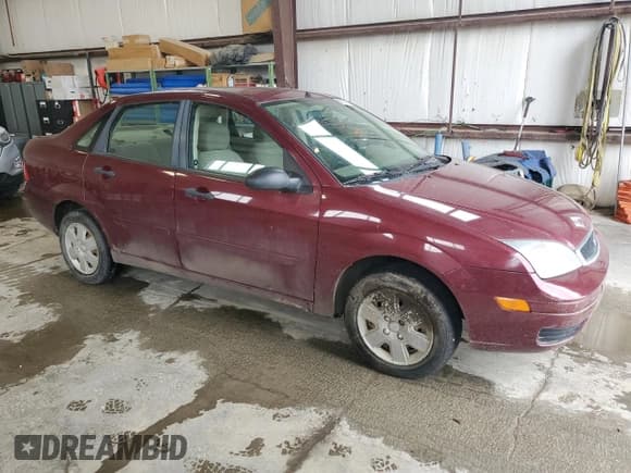 ✅ 2007 Ford Focus S • VIN: 1FAFP34N77W249390 • Lot: 61817215. Listed on Copart with 112,295 mi. Free auction sales archive from the USA and detailed vehicle history report at DreamBid. Image 4.