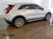 ✅ 2022 Cadillac XT4 FWD Premium Luxury • VIN: 1GYFZCR47NF100232 • Lot: 54520405. Listed on Copart with 68,819 mi. Free auction sales archive from the USA and detailed vehicle history report at DreamBid. Image 3.