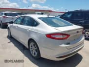 ✅ 2016 Ford Fusion Titanium • VIN: 3FA6P0SU5GR120687 • Лот: 42571006. Опубликован ранее на IAAI с пробегом 143 210 миль. Бесплатный доступ к архиву аукционных продаж из США и подробный отчёт об истории автомобиля на DreamBid. Изображение 14.