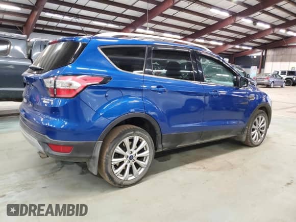 2017 Ford Escape Titanium с VIN 1FMCU9J95HUC08605, выставлен на аукционе Copart как лот 90461165 с пробегом 136 216 миль миль и Чистый • Clean title. История ставок и продаж доступна на DreamBid. Изображение 3.